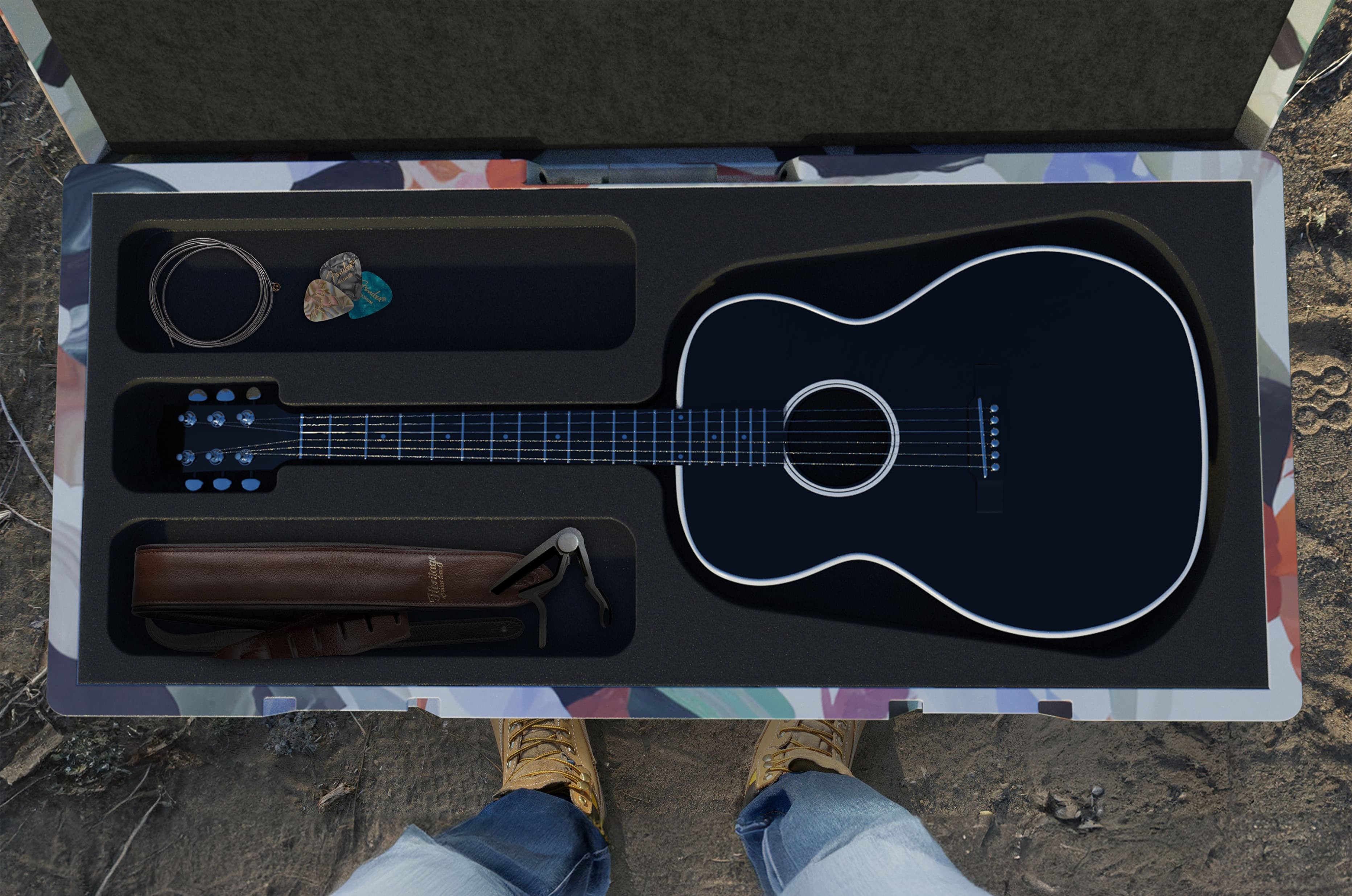 A top view of the guitar case opened. It is holding a guitar and guitar accessories that are neatly sorted by foam cavities.